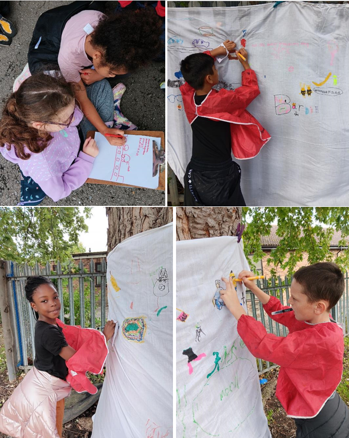 A collage of children drawing on a white sheet

Description automatically generated